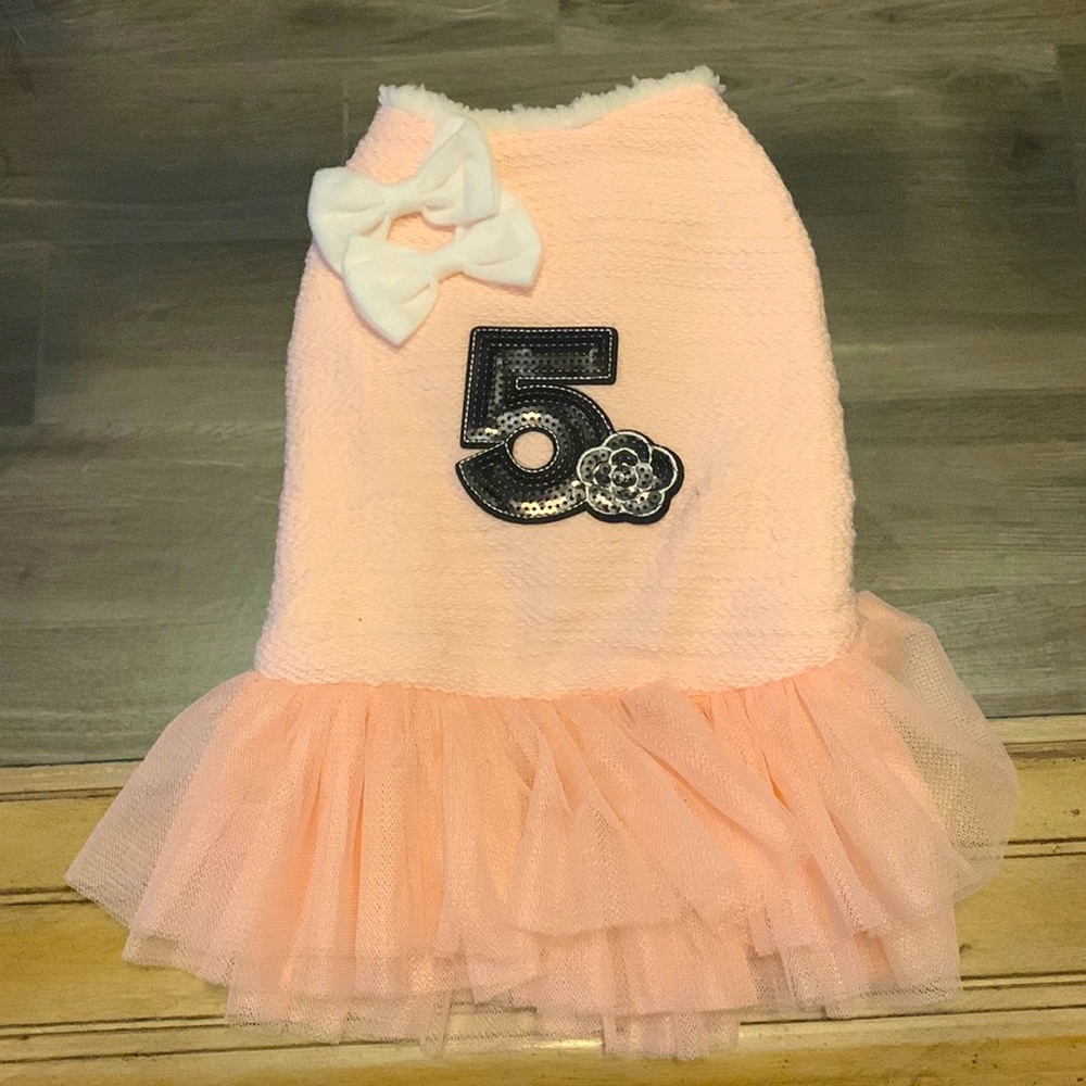 Beautiful baby pink Chewnel number 5 design dress for dogs. It’s brand new!